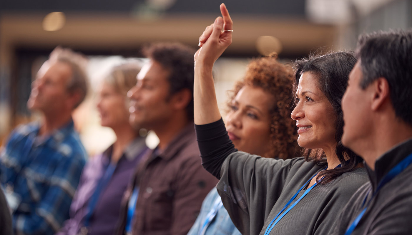 Woman raising hand